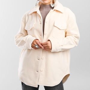 Cream fuzzy flannel, size large. Super soft and comfortable